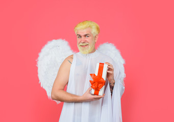 Cupid angel with present box. Love concept. February 14. Cupid with gift box. Valentine angel....