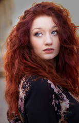 Fototapeta premium A beautiful woman with red hair