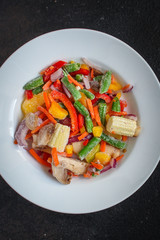 frozen vegetables mix salad (onions, corn, peppers, paprika, mushrooms, asparagus beans, carrots and others, ketogenic diet) menu concept. food background. top view. copy space