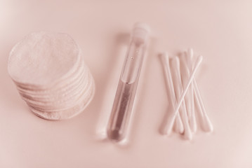 Concept of care face with micellar water and cotton pad top view. Hygiene for skin.