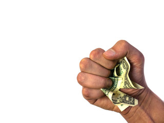 The hand holds and squeezes the dollars.