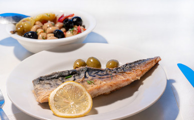 Fototapeta na wymiar fried mackerel on white plate