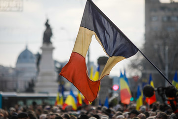 Details with the Romanian flag with a hole, the symbol of the Romanian Revolution from December...