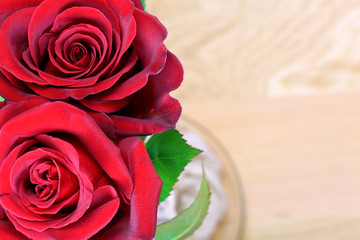 Red roses on wood background, Valentine background, love and wedding