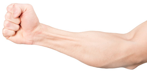Hand of a young man clenched into a fist