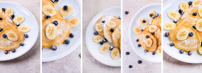 set, delicious pancakes with banana and blueberries on a white plate