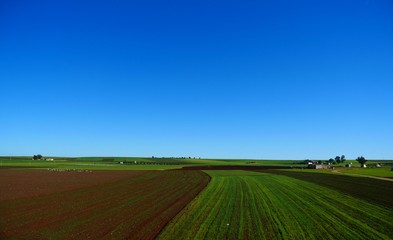 Bright landscape of Morocco, breathtaking curves of mountains, stunning combination of hills & farm land,inadvertent distribution of houses & huts, raw impression of pure nature.