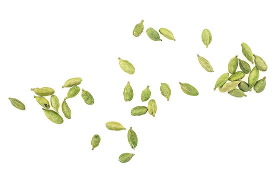 Dried green cardamom seeds isolated on a white background, top view.