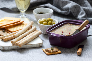Chicken liver, onion and carrot paste, served with crackers, grissini, olives, capers and champagne.
