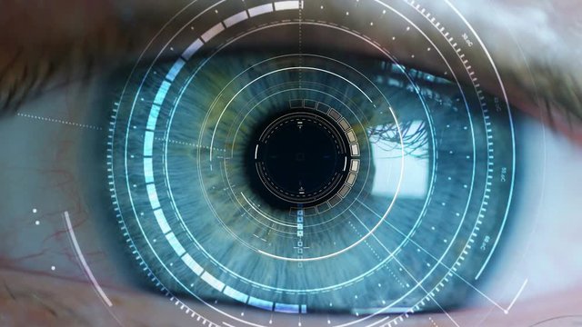 Macro shot of blue humans eye with futuristic scanning technology.