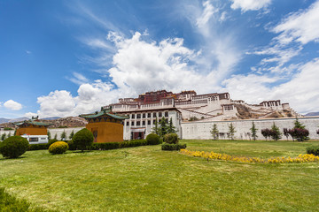 Stunning view of Potala Palace in summer sunny day, winter palace of Dalai Lama, blue sky and cloud in background, Lhasa (Lasa) of Tibet, China
