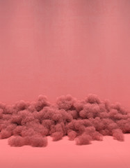Fototapeta premium Creative composition in monochrome pink color from a pile of skeins of wire on a background of an empty wall. Installation of contemporary art in a minimalist design with copy space. 3D rendering.