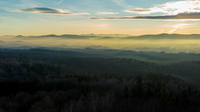 The misty landscape of the Karkonosze Giant Mountains, Poland during sunrise - time lapse