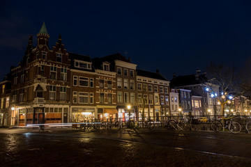 Fototapeta na wymiar Utrecht Oudegracht canal at night with illuminated canal houses