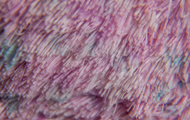 multi-colored thread pattern. random fibers. fragment of synthetic soft coating
