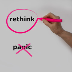 The word rethink is circled with a pink pencil by a hand with a bubble. The word panic is crossed...
