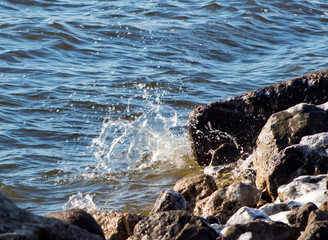 Waves crashing into rocks