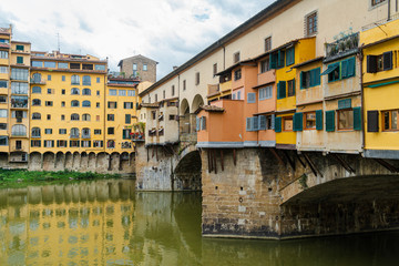 Fototapeta na wymiar Bridge Ponte Vecchio over Arno river in Florence