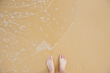 feet in the sand