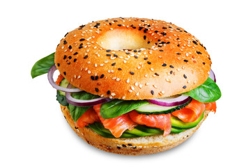 Smoked salmon spinach avocado cucumber bagel on a white isolated background