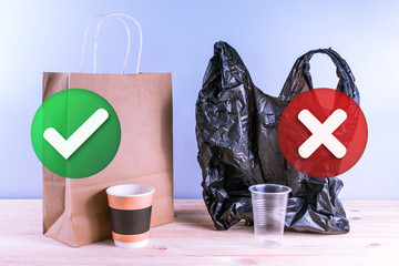 Paper bag and paper cup vs plastic bag and plastic cup. Environmental choice concept.
