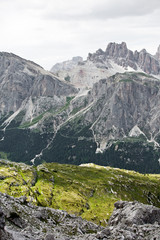 Hiking Dolomites mountains of Passo Giau. Peaks in South Tyrol in the Alps of Europe. Alpine meadows
