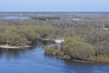 Fototapeta na wymiar Gomel from a height in early spring. View of the river Sozh.