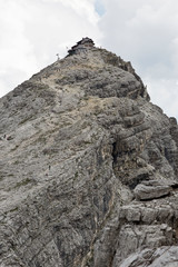 Hiking Dolomites mountains of Passo Giau. Peaks in South Tyrol in the Alps of Europe. Alpine house