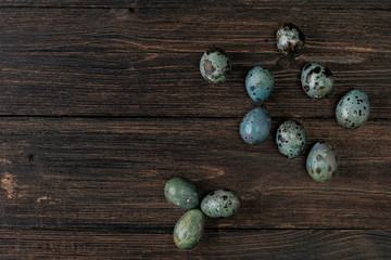 Obraz na płótnie Canvas Quail eggs on wooden background