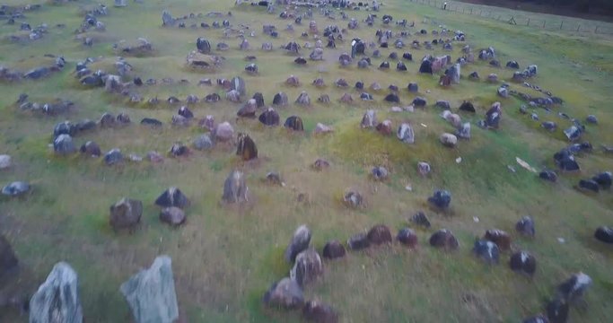 Aerial low angle viking burial ground mound grave