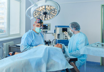 Man surgeon at work in operating room