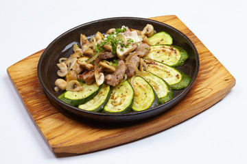 meat with vegetables on the white background