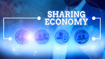 Word writing text Sharing Economy. Business photo showcasing collaborative consumption or peer to peer based sharing
