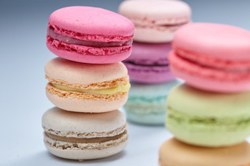 tasty macaroons on the grey background