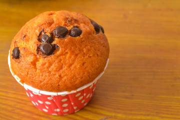 Cupcake on the table, muffin with chocolate