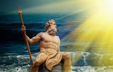 Fototapeta na wymiar A formidable and powerful god of the sea and oceans Neptune (Poseidon). Fragment of ancient statue.