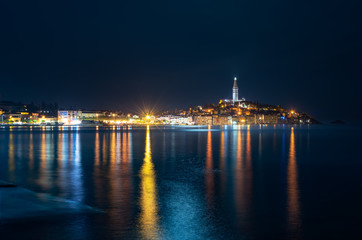 Fototapeta na wymiar Rovinj Croatia summer night sea reflection