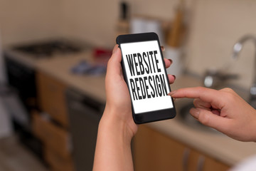 Conceptual hand writing showing Website Redesign. Concept meaning modernize improver or evamp your...