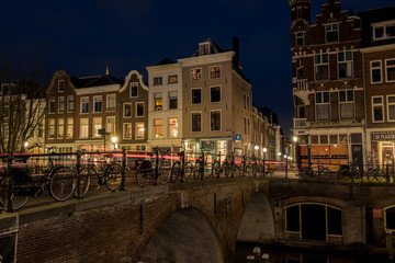 Utrecht Oudegracht canal at night with illuminated canal houses