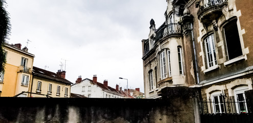 Rooftops and old manor in Chintreuil Street in Bourg-en-Bresse. 