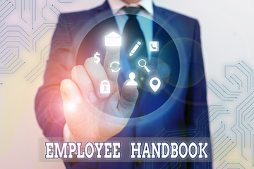 Conceptual hand writing showing Employee Handbook. Concept meaning states the rules and regulations...