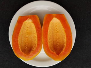 The papaya (Carica papaya) (from Carib via Spanish), papaw, or pawpaw is the fruit of the plant...