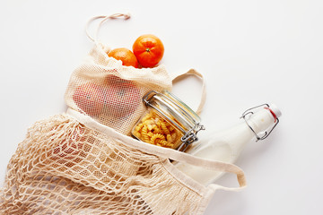 Zero waste, plastic-free and eco-friendly lifestyle and shopping. Cotton mesh bag, products in...