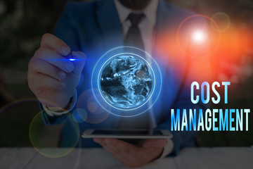 Conceptual hand writing showing Cost Management. Concept meaning process of planning and...