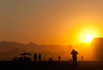 silhouette of man on top of the mountain