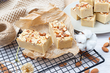 Fudge on a light table with nuts
