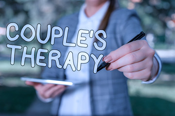 Conceptual hand writing showing Couple S Therapy. Concept meaning treat relationship distress for individuals and couples Outdoor background business woman holding laptop and pen