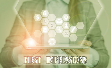 Conceptual hand writing showing First Impressions. Concept meaning first consideration or judgment...
