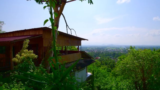 Aerial view of Ban Tham subdistrict from Wat Phrathat Chom Sin viewpoint, Phayao province.