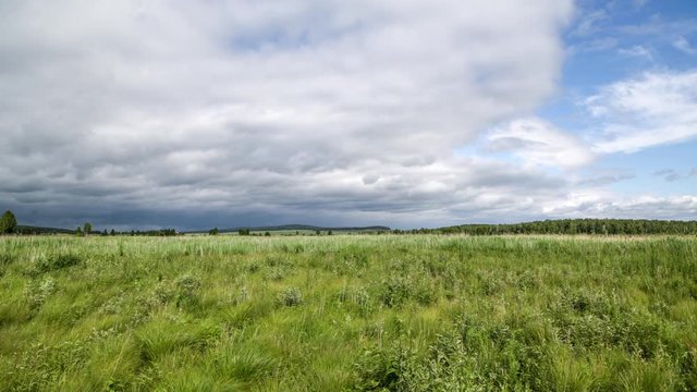 Field and clouds, time lapse, cam5